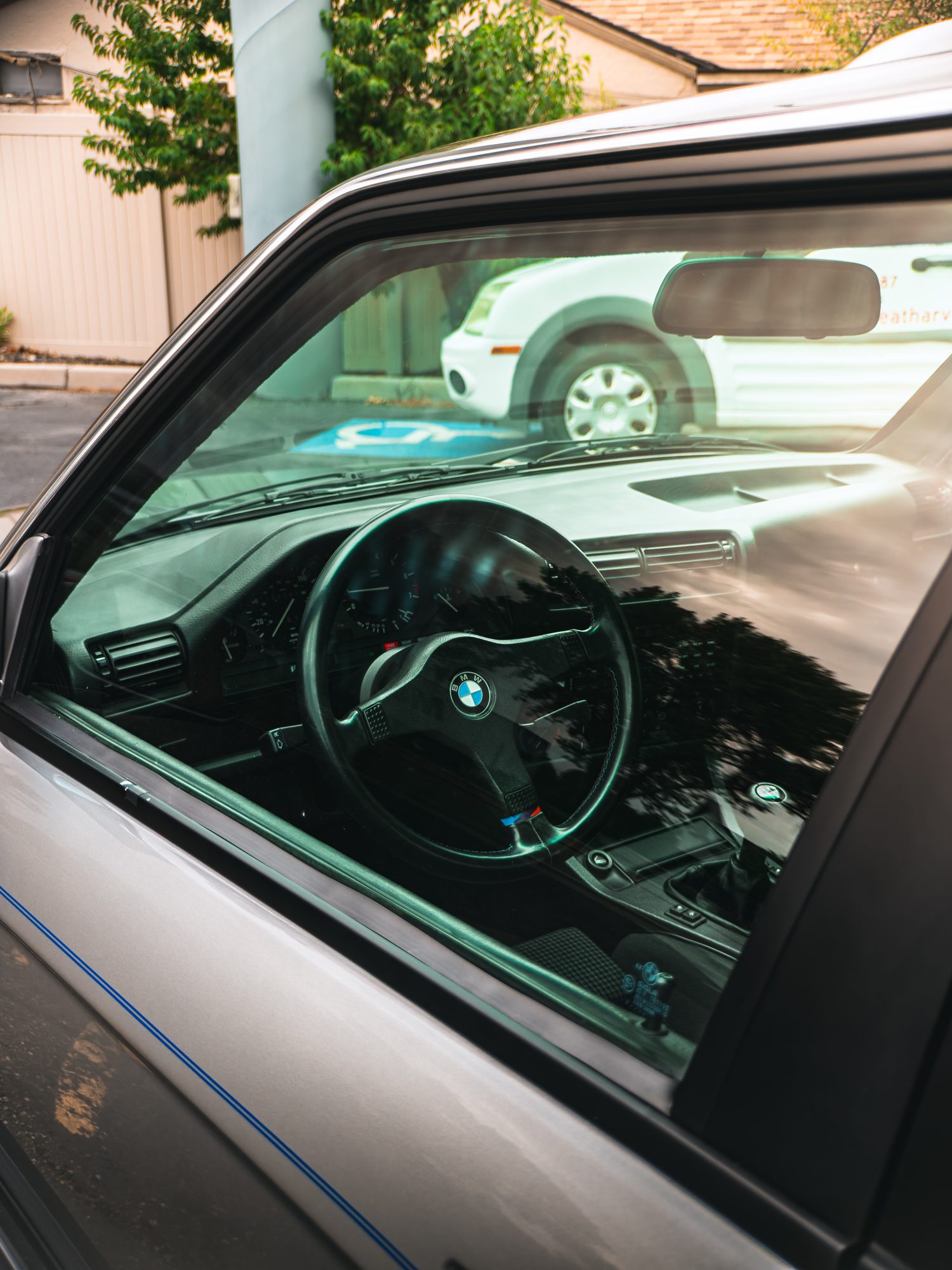 BMW E30 325iX interior through the window