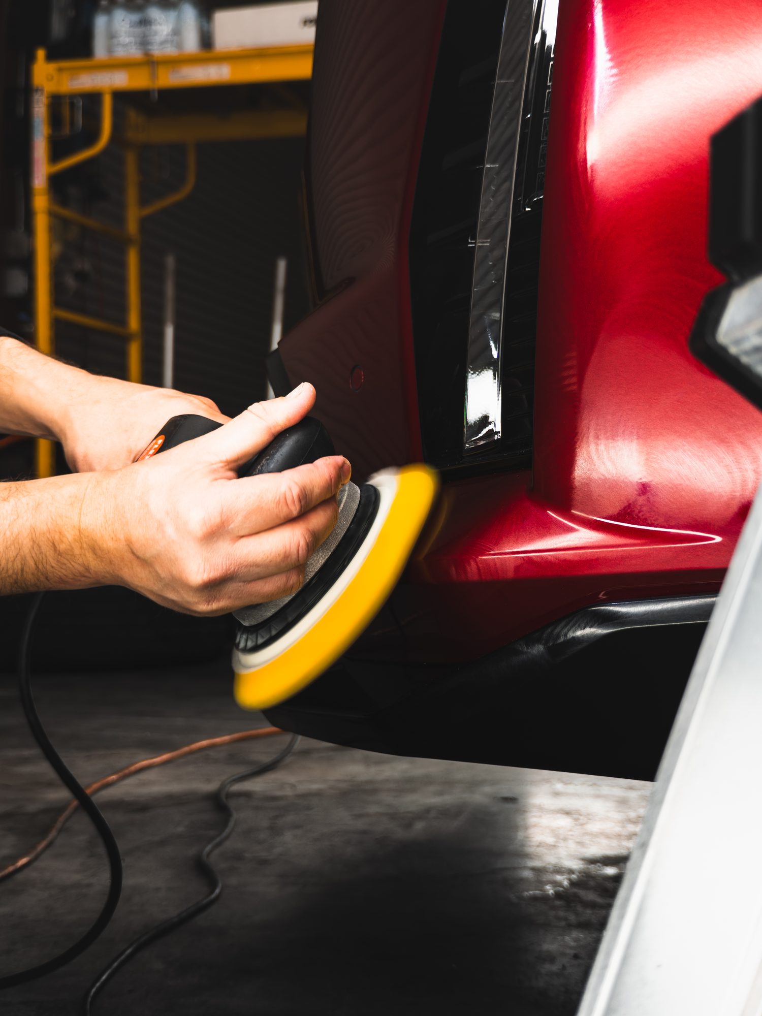 Machine polishing the Escalade-V paint