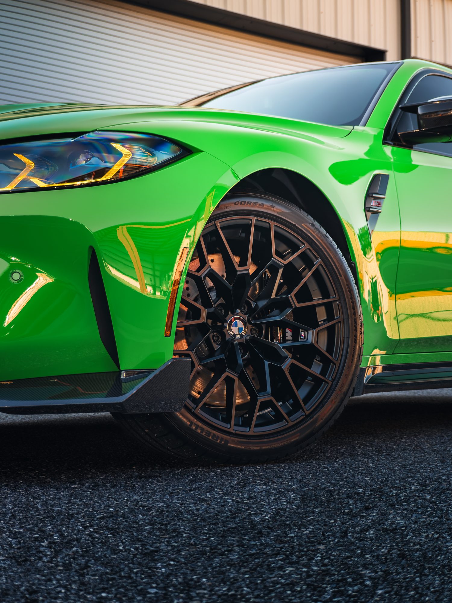 M3 CS forged wheel at golden hour