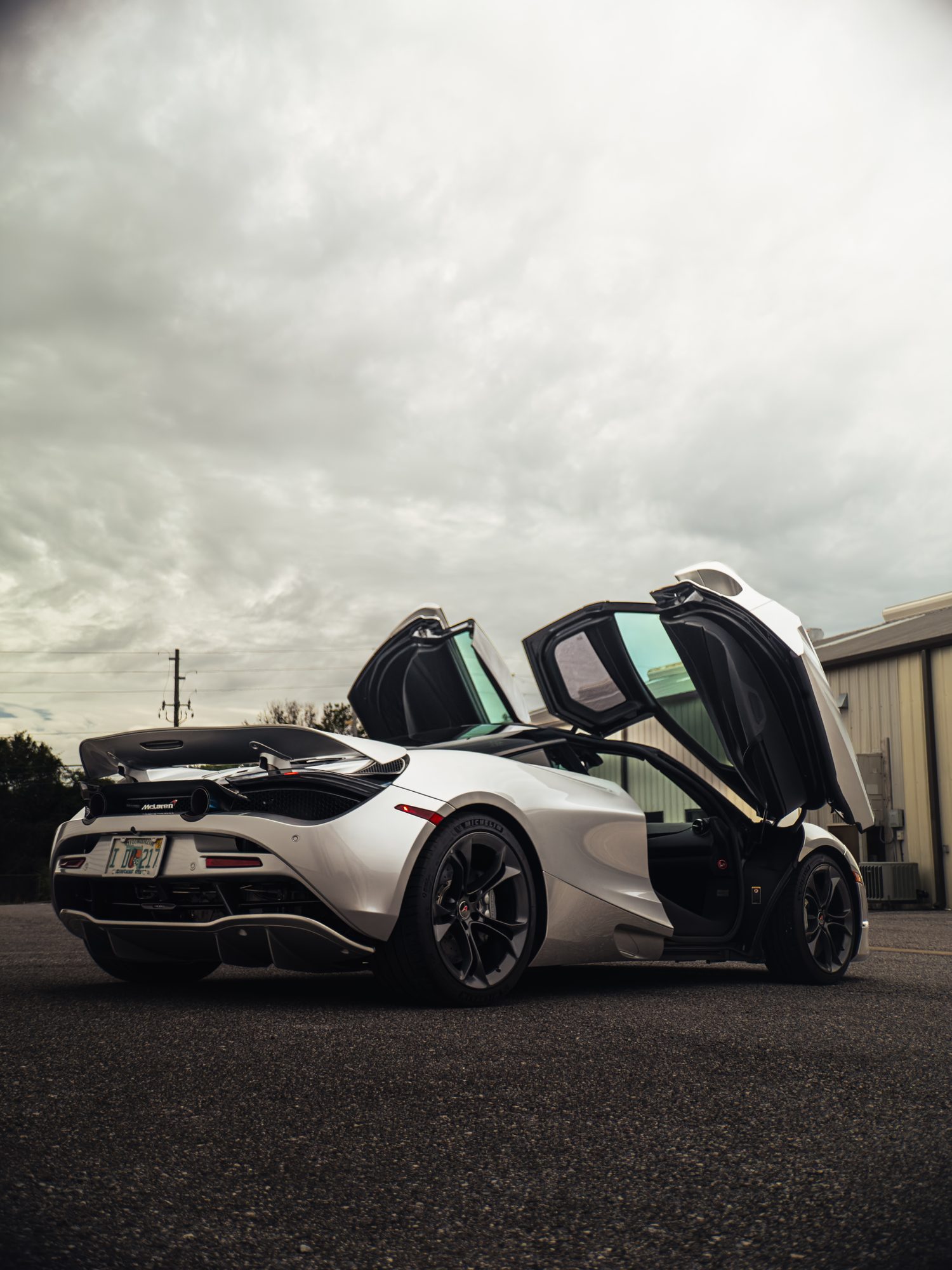 McLaren 720S, rear three-quarter with doors open