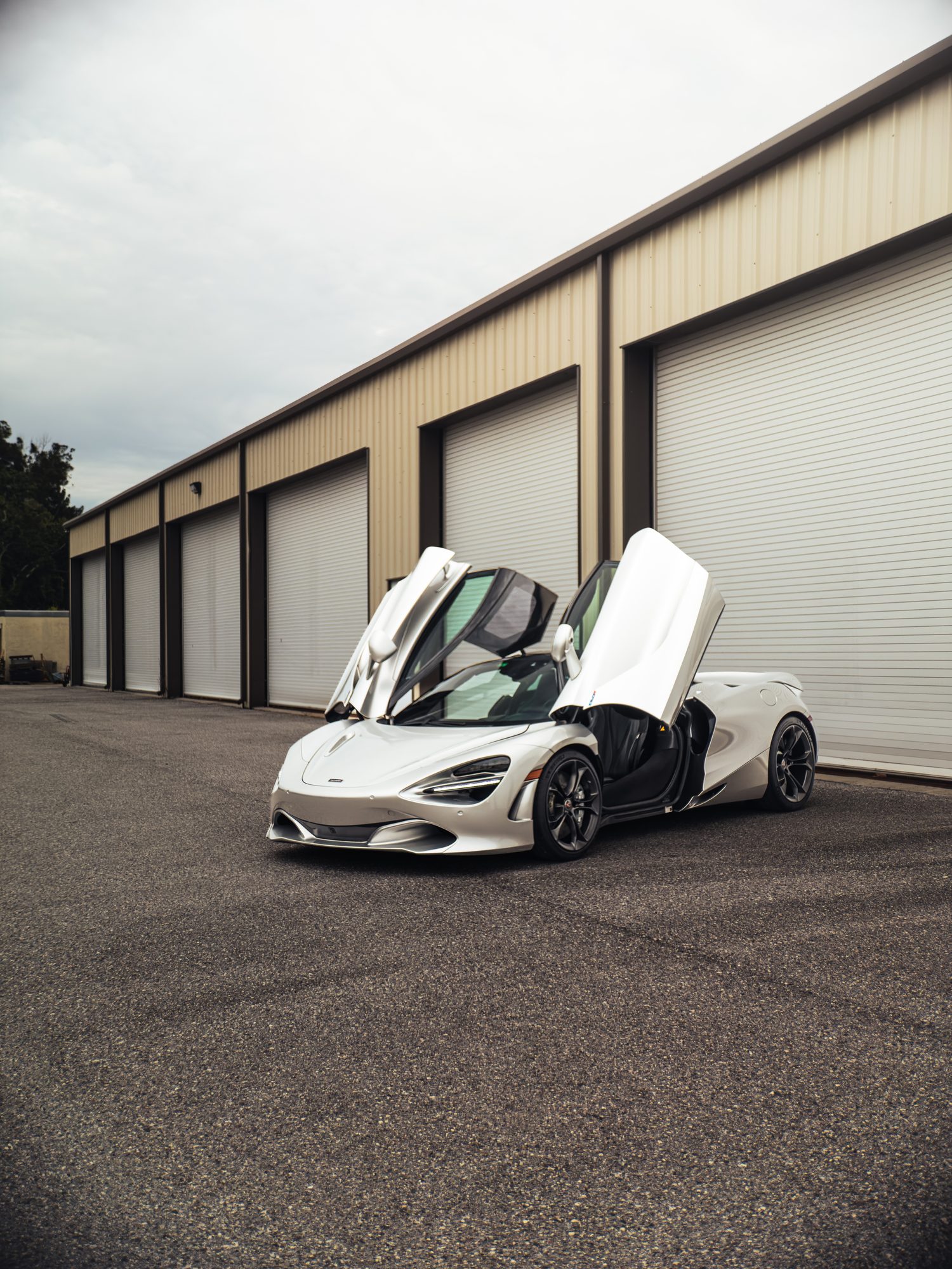 McLaren 720S, front three-quarter with doors open